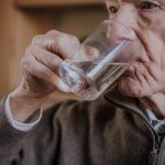 Old Man Drinking Water Closeup